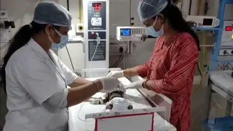Baby Placed Living in India Battles for Her Life